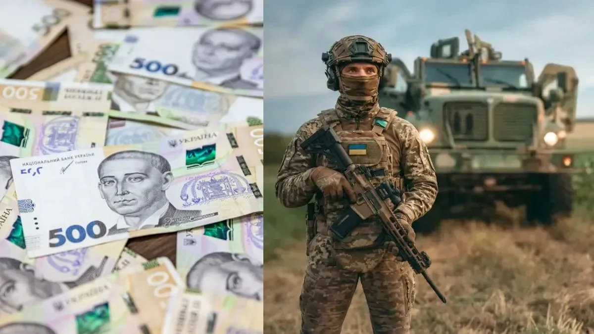 Українські банкноти по 500 гривень та військовослужбовець ЗСУ з автоматом на фоні техніки, ілюстрація доплати 10 тисяч гривень військовим