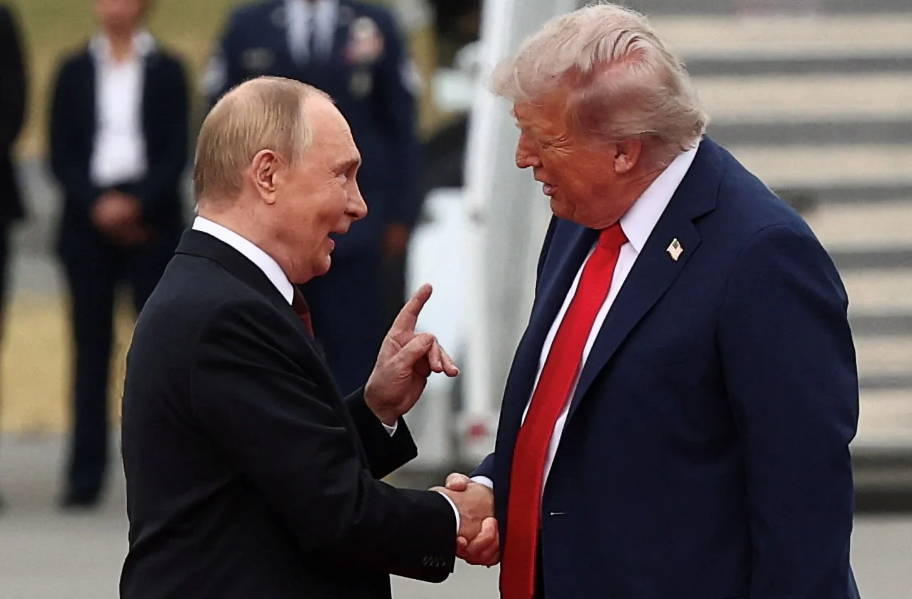 Володимир Путін і Дональд Трамп під час зустрічі щодо співпраці між країнами